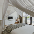 The Beach Villa Cemagi Bedroom One with Four Poster Bed and TV | Seseh, Bali