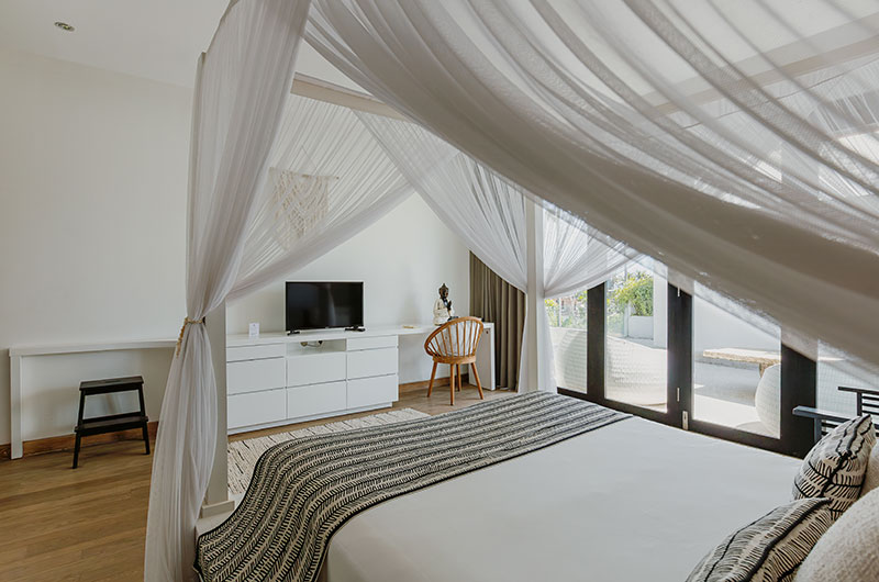 The Beach Villa Cemagi Bedroom One with Four Poster Bed and TV | Seseh, Bali