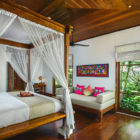 Villa Bukit Naga Bedroom with Couch and Garden View | Gianyar, Bali