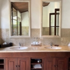 Villa Bukit Naga His and Hers Bathroom with Mirrors | Gianyar, Bali