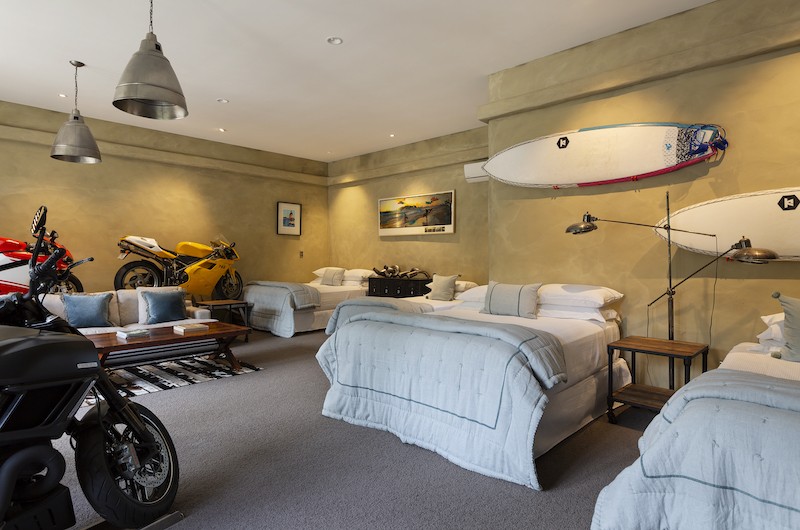 Ataahua Lodge Twin Bedroom with Motorcycle Model | Whakamarama, Bay of Plenty