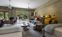 Ataahua Lodge Bedroom with Motorcycle Model | Whakamarama, Bay of Plenty