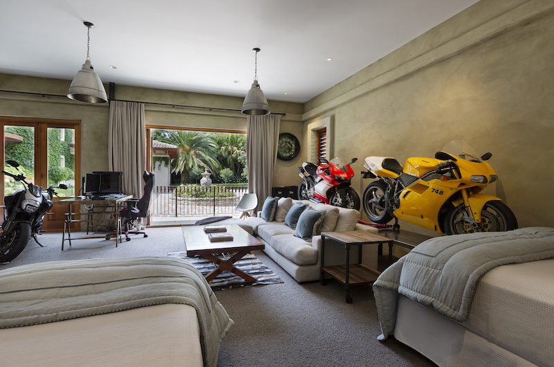 Ataahua Lodge Bedroom with Motorcycle Model | Whakamarama, Bay of Plenty Ataahua Lodge Bedroom with Motorcycle Model | Whakamarama, Bay of Plenty