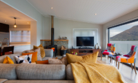 Kohanga Luxury Lakeside Villa Living Room with Fire Place | Queenstown, Otago
