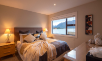 Kohanga Luxury Lakeside Villa Guest Bedroom with Lake View | Queenstown, Otago