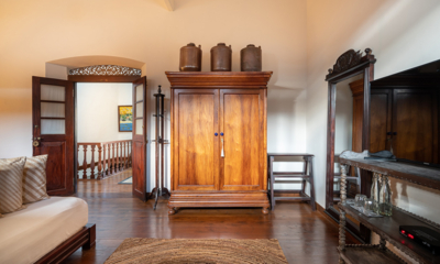 42 Lighthouse Street Bedroom with Wooden Floor and TV | Galle, Sri Lanka