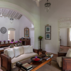 Rock Villa Two Bedroom Walauwwa Suite Living and Dining Area with Hanging Lights | Bentota, Sri Lanka