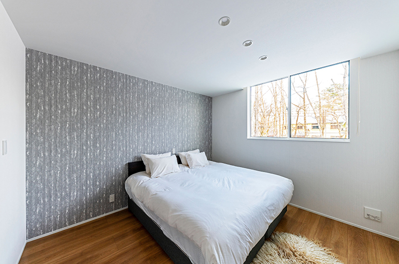 Grey Wolf Chalet Bedroom with Wooden Floor | Hakuba, Nagano