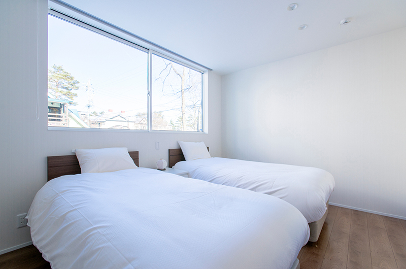 White Fox Chalet Twin Bedroom with Wooden Floor | Hakuba, Nagano