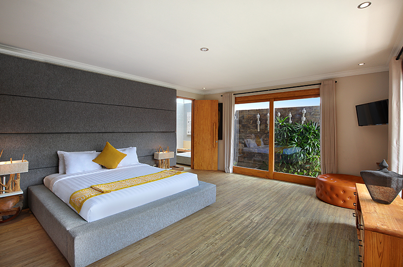 Villa Boutique Sunset Guest Bedroom with Wooden Floor | Seminyak, Bali