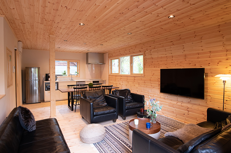 Villa Antelope Hakuba II Living Room with Wooden Wall | Hakuba, Nagano Villa Antelope Hakuba II Living Room with Wooden Wall | Hakuba, Nagano