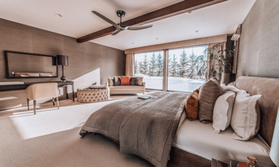 Seasons Residence Master Bedroom Two with Seating Area and View | Annupuri, Niseko