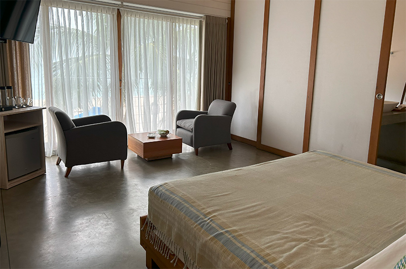 Ubuntu Beach Villas Bedroom Seven with Seating Area | Mirissa, Sri Lanka