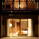 Andaru Niseko Villas Bedroom View from Outside at Night | Soga, Niseko