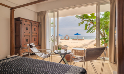 The Beach House Ocean Terrace Suite Bedroom with Seating Area and Sea View | Mirissa, Sri Lanka