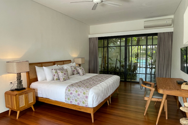 Villa Bogor Bedroom with TV and Wooden Floor | Canggu, Bali Villa Bogor Bedroom with TV and Wooden Floor | Canggu, Bali