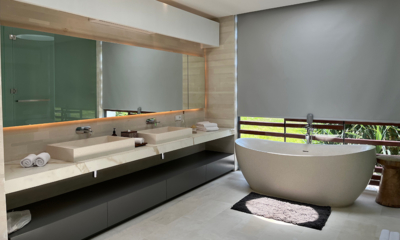 Villa Babadan His and Hers Bathroom with Bathtub and Mirror | Canggu, Bali