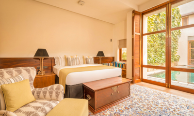 Ishq Colombo Bedroom with Seating Area and Pool View | Chaweng, Koh Samui