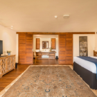 Ishq Colombo Bedroom with Wooden Floor and TV | Chaweng, Koh Samui