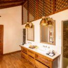 Ishq Colombo En-Suite Bathroom with Mirrors and Wooden Floor | Chaweng, Koh Samui