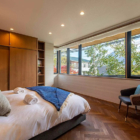 Zai On Bedroom with Side Lamps and View | Niseko, Japan