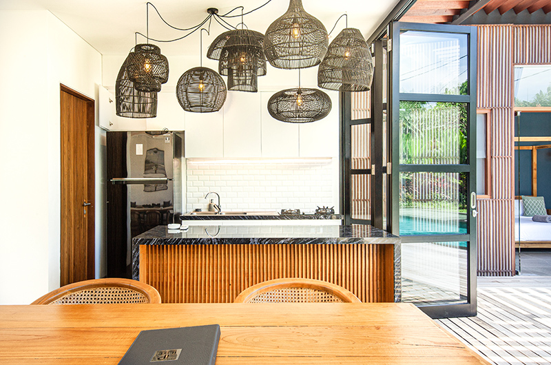 Villa Boddisatva Kitchen and Dining Area with Hanging Lamps | Pererenan, Bali
