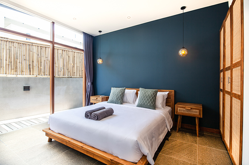 Villa Boddisatva Bedroom Five with Hanging Lamps and Side Tables | Pererenan, Bali