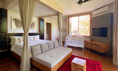 Villa Kimaya Bedroom with Baby Cot and TV | Canggu, Bali