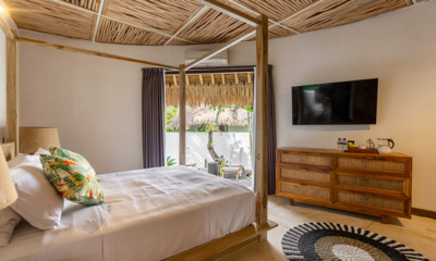 Villa Naya Bedroom with Four Poster Bed and TV | Canggu, Bali