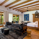 Villa Wolfe Bedroom One with Sofa and Pool View | Seminyak, Bali