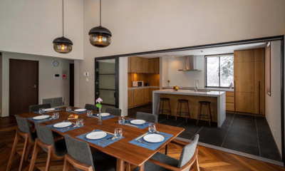 Jade Rabbit Kitchen and Dining Area with Hanging Lamps | Hirafu, Niseko