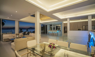 Villa Nirvana Panwa Indoor Living and Dining Area at Night | Cape Panwa, Phuket