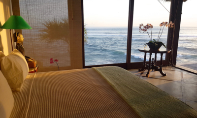 Villa Bahagia Bedroom with Side Lamps and Ocean View | Nusa Lembongan, Bali