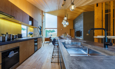 Foxwood E Kitchen and Dining Area with Hanging Lamps and View | Niseko, Japan