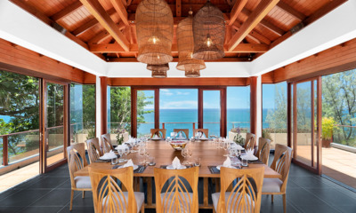 Villa Horizon Indoor Dining Area with Hanging Lights and Sea View | Kamala, Phuket