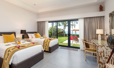 Villa Pantai Kubu Bedroom One with Twin Beds and Garden View | Tulamben, Bali