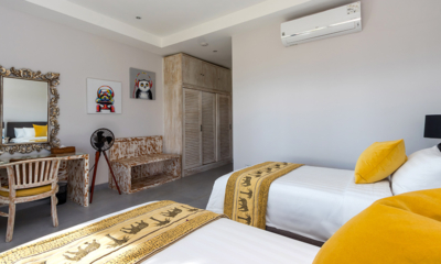 Villa Pantai Kubu Bedroom One with Twin Beds and Dressing Area | Tulamben, Bali