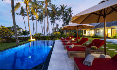 Villa Pantai Kubu Pool Side Seating Area at Night | Tulamben, Bali