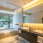 Iori Niseko His and Hers Bathroom with Bathtub | West Hirafu, Niseko