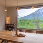 Sanga House Niseko Dining with Hanging Lamps and View | East Hirafu, Niseko
