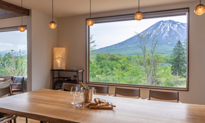 Sanga House Niseko Dining with Hanging Lamps and View | East Hirafu, Niseko