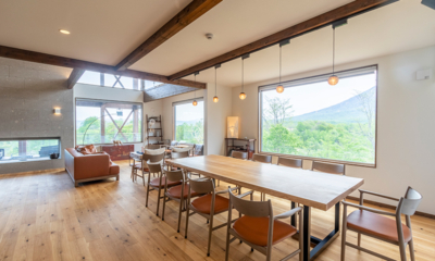 Sanga House Niseko Living and Dining Area with Hanging Lamps and View | East Hirafu, Niseko