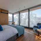 Sena Bedroom with Seating Area and Snow View | Hirafu, Niseko