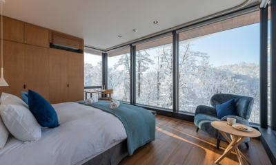Sena Bedroom with Seating Area and Snow View | Hirafu, Niseko