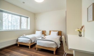 Blue Heron Bedroom Two with Twin Beds and Study Area | Rusutsu, Hokkaido