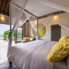 Katoni Villa Bedroom One with Seating Area and Sea View | Nusa Lembongan, Bali