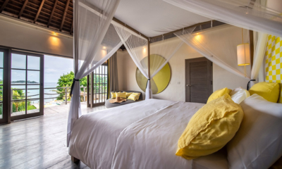 Katoni Villa Bedroom One with Seating Area and Sea View | Nusa Lembongan, Bali