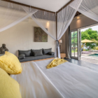 Katoni Villa Bedroom Three with Sofa and Pool View | Nusa Lembongan, Bali
