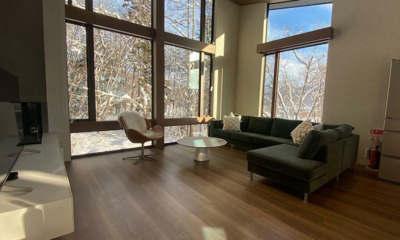 Chalet Infinity Indoor Living Area with Snow View | Hakuba, Nagano