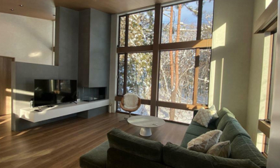 Chalet Infinity Indoor Living Area with TV and Snow View | Hakuba, Nagano